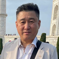 Baekhee Han, owner and CEO of DBI Exchange, client testimonial photo